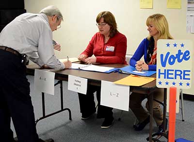 Voter Signing in at polling place