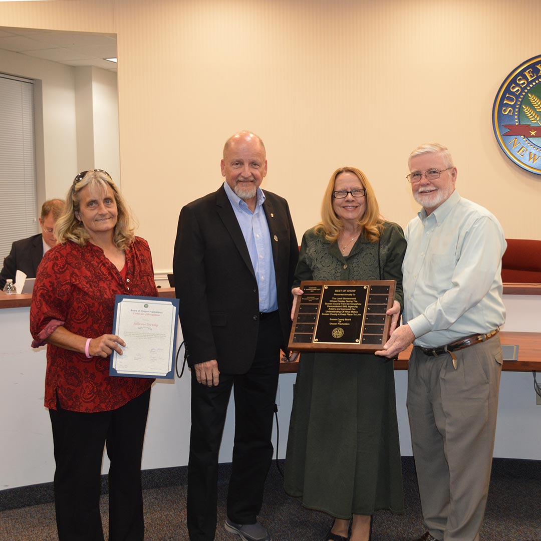 Accepting Tanya and Steven Stark with Mayor Lisa Chammings with Freeholder Director Herb Yardley