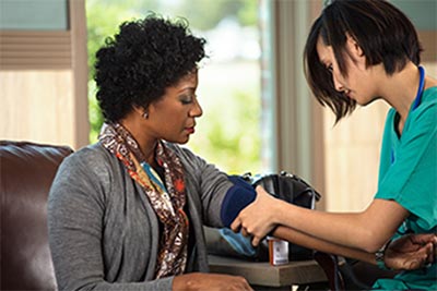 Woman Having Her Blood Pressure Taken