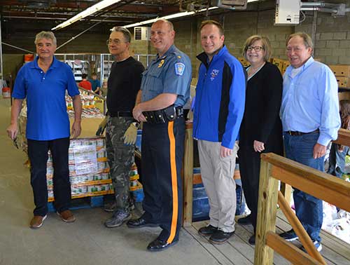 Byram Chief Peter Zabita, Acting Sparta Chief Neil Spidaletto, Department of Health & Human Services Administrator Carol Novrit, and volunteers