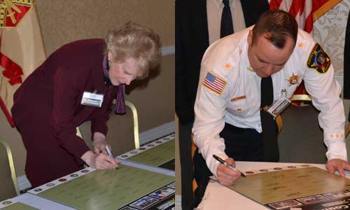 People signing Community Covenant