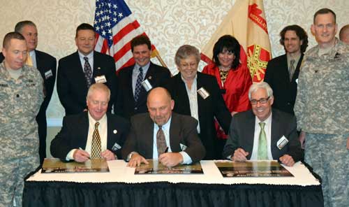 People signing Community Covenant
