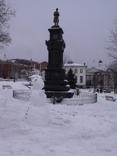 Civil war monument with snowman